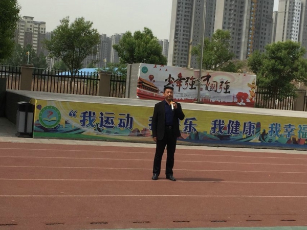 郑州市高新区五龙口小学举行“地震应急安全疏散”演练活动
