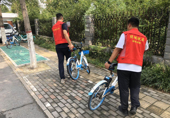 郑州市石佛办事处联合高新区交通治理中队开展共享单车集中整治行动