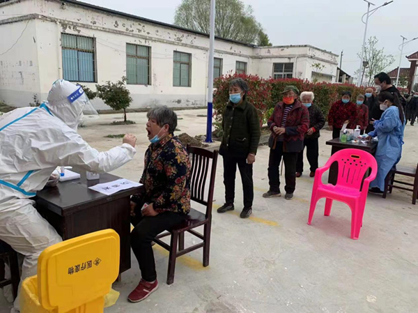 邓州市组织开展乡镇全员核酸检测 实战演练