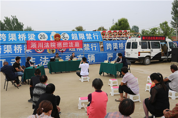 淅川县法院：违规占道加水致人亡 经营者驾驶者均担责