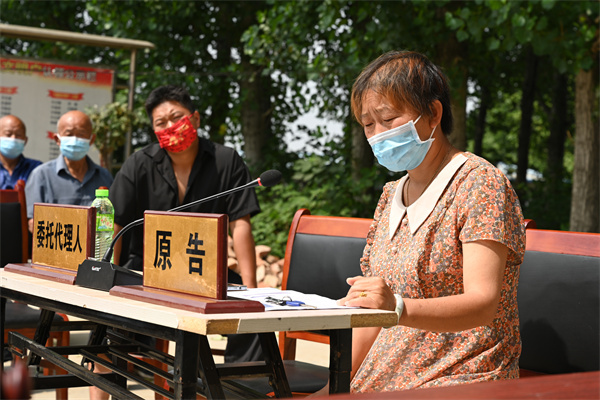 唐河县法院：私搭乱建起纷争，村部响起法槌声