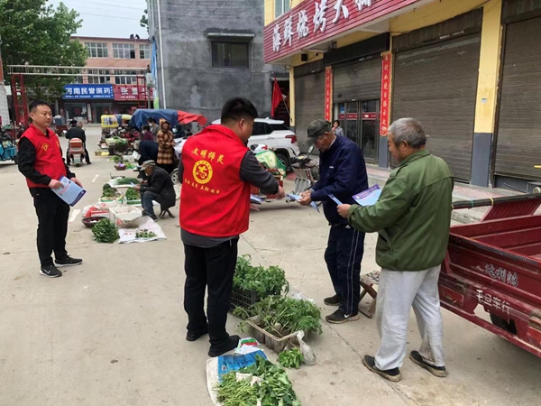 西平县师灵镇组织开展反诈宣传进商户、入集市活动