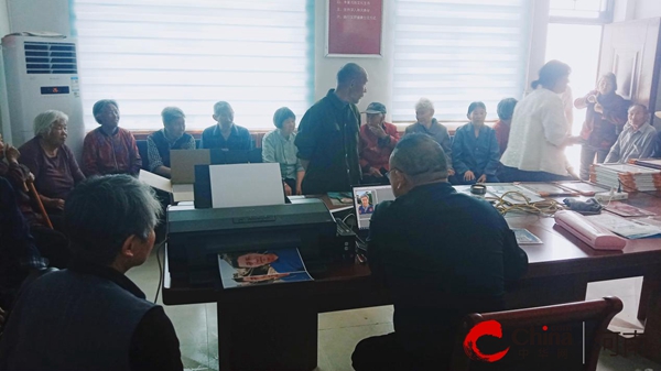 驻马店市驿城区朱古洞乡:公益摄影进乡村 温情服务暖民心